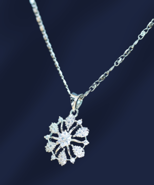 close-up of 925 sterling silver pendant necklace in the blue background.